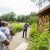 Graduate student Sean Griffin explains the bee condo