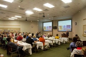 Dr. Rick Foster addresses the public at the October 2015 Dessert with Discussion event
