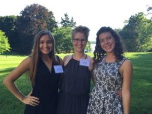 Photo of blog author Olivia Porth lab partners Clare Harper, Katie McCullen and I on the day of the research symposium.