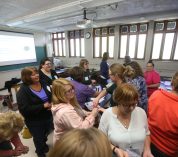 Middle & high school teachers participate in a learning activity about greenhouse gases