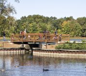 Sanctuary guests walking on the Thomas Bridge at the Bird Sanctuary