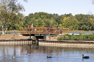 Sanctuary guests walking on the Thomas Bridge at the Bird Sanctuary