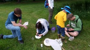 Participants examine samples at Lux Arbor
