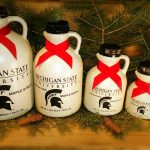 Various sized bottles of maple syrup from the Kellogg Forest