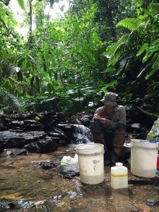 PhD student Kyle Jaynes conducting field work