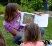 Misty Klotz reads to children at a Wild Wednesdays event.