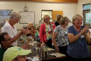 KBS volunteers applaud at the annual volunteer recognition dinner.