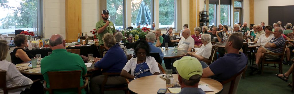 Kellogg Forest Manager KJ Kettler talks to a room full of KBS volunteers