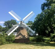 The windmill for which KBS's Windmill Island is named, stands against a blue summer sky.