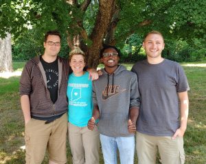 Jabarius Jones poses with members of his research team.
