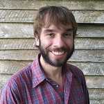 Headshot of a smiling Jackson Helms.