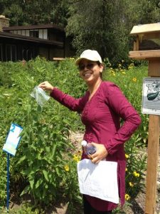 Joelyn de Lima showing transpiration via a leaf trapped in a plastic bag in the Kellogg Bird Sanctuary garden