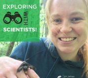 Alice Puchalsky smiles at the camera, showing off a moth that's landed on her hand. Text overlay reads Exploring with Scientists.