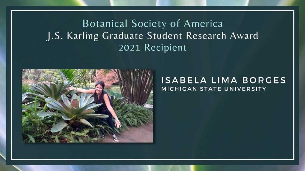 Image announcing Isabela Borges as winner of the 2021 J.S. Karling Graduate Student Research Award, featuring a photo of Borges posing with arms outstretched to show the size of the large plant next to her.