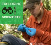 Kyle Jaynes sits in a forested area, looking down at a small object in his hands. Text overlay reads Exploring with Scientists.