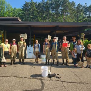 BioBlitz participants who surveyed for herps pose for a photo outside the W.K. Kellogg Bird Sanctuary.