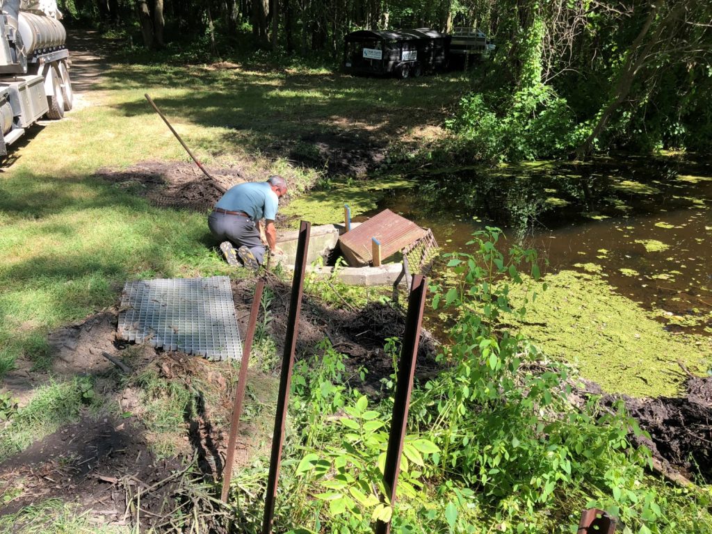 Stu Bassett works near the lagoon on Windmill Island.