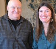 Jim Allen and Nicole Kokx post for a photo at Allen’s retirement reception.