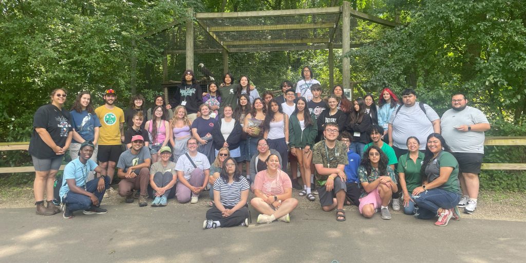 Group photo of the people who attended the naming ceremony for the W.K. Kellogg Bird Sanctuary’s resident bald eagles.