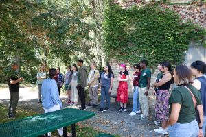 Envision EEB attendees listen to a speaker while at the W.K. Kellogg Biological Station.