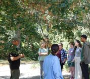 Envision EEB attendees listen to a speaker while at the W.K. Kellogg Biological Station.