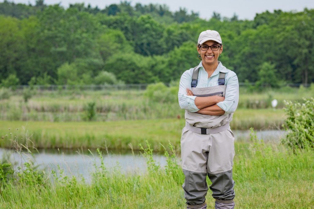 Dr. Alisha Shah of W.K. Kellogg Biological Station’s Shah Lab stands outside the pond laboratories in Hickory Corners, Mich., on June 3, 2025.