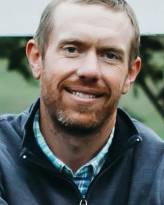 Head shot photo of Brook Wilke.